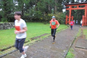 Runners about to finish the Ishidan Marathon