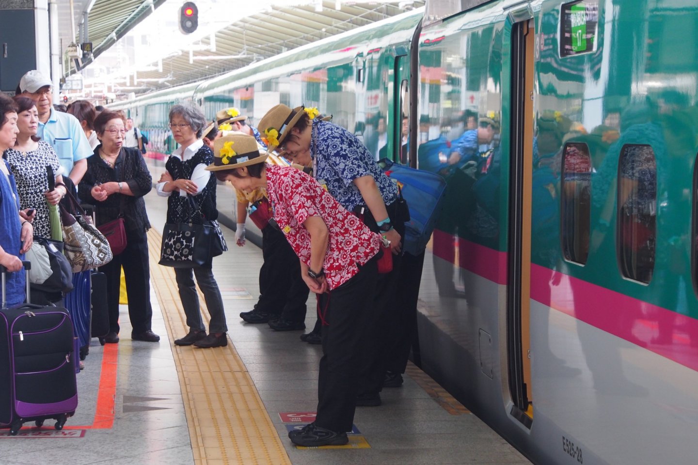 The colourful, super-efficient Shinkansen cleaning staff