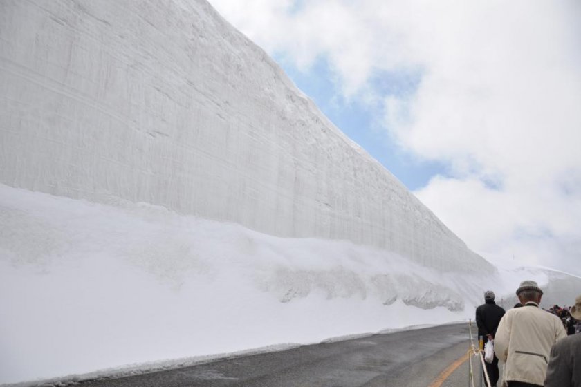 The snow walls were as high as 15 meters that day.  Oh, bring a hat to protect you from the sun and to keep you warm if needed.