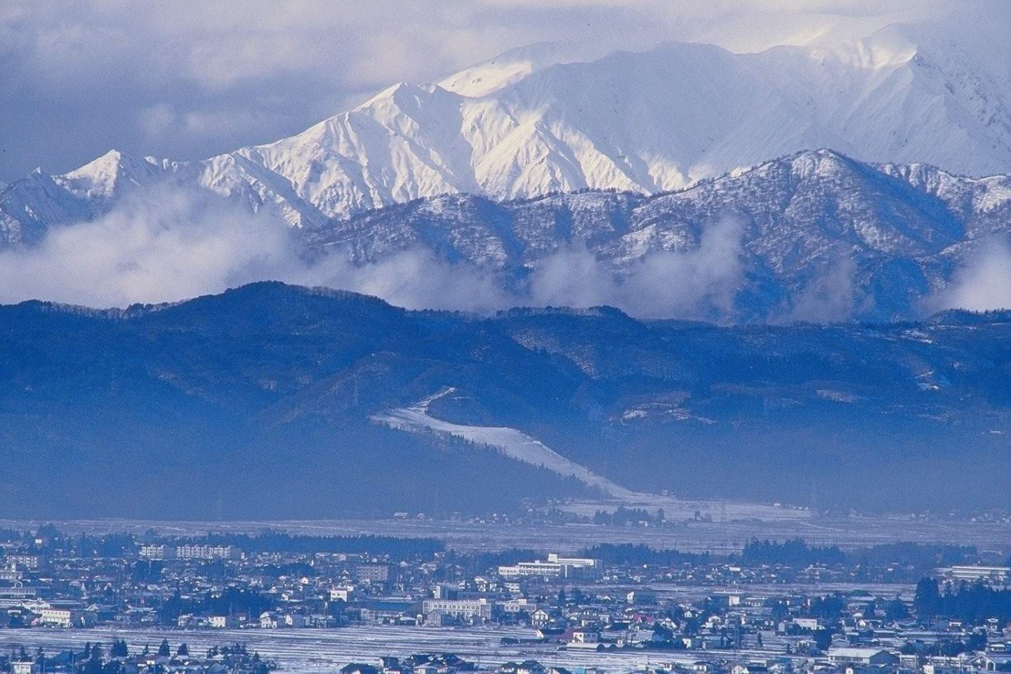 Winter snows cover the surrounding mountains