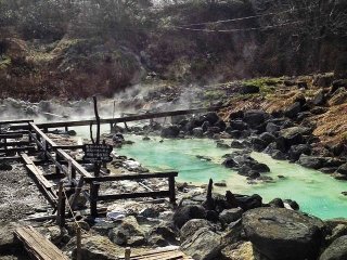 This sulphurous pool bubbles in the grounds of Kuroyu, but don&#39;t touch the water - it&#39;s scalding hot! Water is piped from the source to the different pools, cooling down to a bearable temperature along the way.