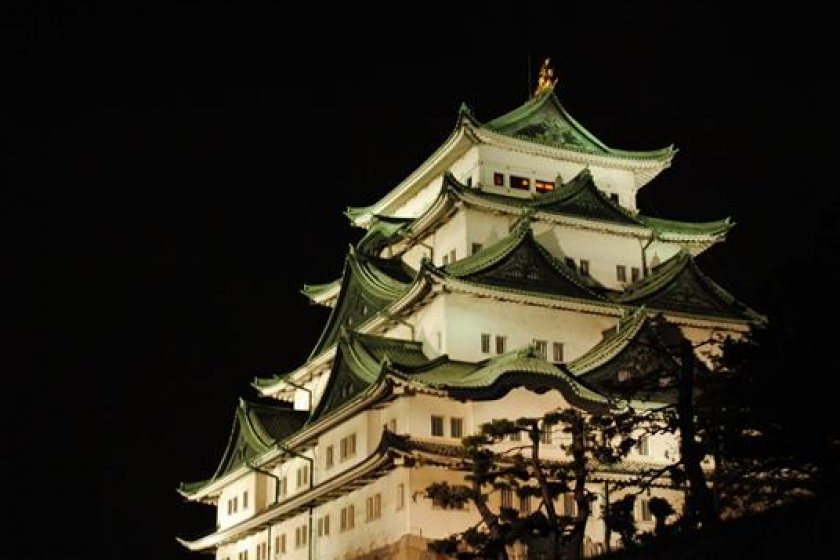 View of Nagoya Castle\'s donjon lit up at night