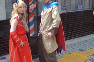 Cosplay Couple in front of Barber shop