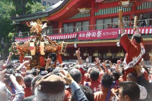 Directing the mikoshi through the crowds