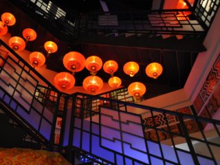 Beautiful red lanterns spiral up the staircase