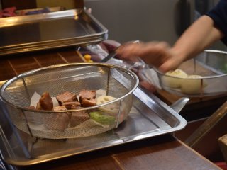Staff will prepare what you order in wire dishes, ready to place into the steam ovens
