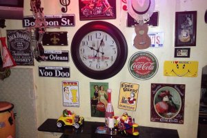 Musical instruments and M&amp;Ms decorations mix with signs of Bourbon Sstreet and Coca Cola