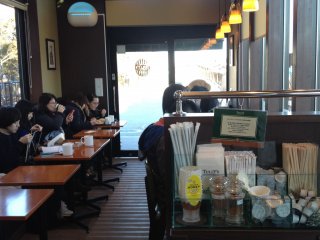Snap of the Tully&#39;s Coffee shop from the inside. Around 6 seats are available on the window side facing Tokyo&nbsp;Skytree, but they&nbsp;are mostly occupied. You may have to wait for your turn.