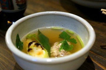 <p>Duck tsukune with grilled leak soup</p>