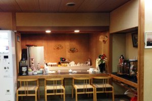 An intimate yet understated sushi bar counter awaits you at Hotel Yoshida