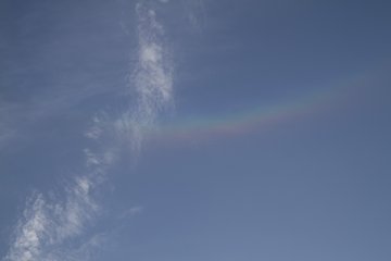 <p>Looks like a rainbow, but it&#39;s a halo; not a raincloud in the sky</p>