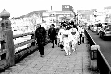 <p>Some people stroll along the river, while others enjoy shopping in the busy neighborhoods near the many bridges</p>