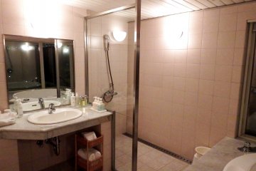 <p>This bathroom has a separate shower booth</p>