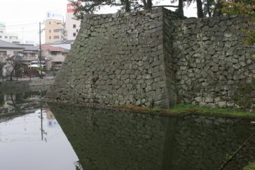 Tsu Castles impressive stone walls