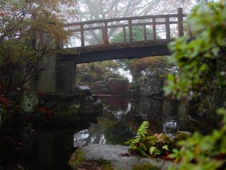 Very traditional bridge and small pond at the top of the mountain.