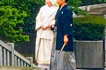 <p>A bride and groom. Notice how the bride is wearing a &#39;Shiro-Kakeshita&#39; (a white kimono)</p>