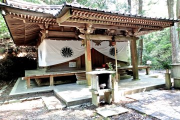 Hiking over the mountain, from Kurama to Kibune, you will suddenly come upon some small shrines/temples
