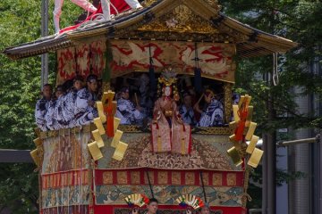 Tsuki-Hoko (月鉾) During the Yamaboko Junko (山鉾巡行) in Kyoto, 2012! This float derives its name from the crescent moon mounted on the top of its pole. Halfway up the pole, the deity of the moon known as Tsukiyomi-no-Mikoto is enshrined