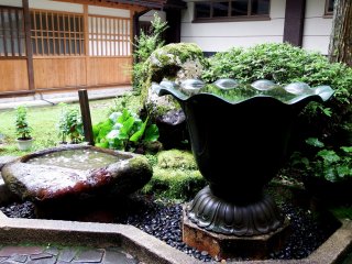 Water basins standing in front of Kichijōkaku Hall