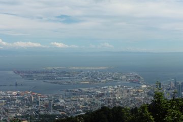 <p>The small island in the middle of the picture is Kobe Airport. In the distance is Kansai Airport which can be seen well when the sky is clear</p>