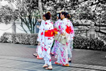 <p>A group of young women wearing some very bright and beautifully colored Yukata (Summer Kimono)</p>