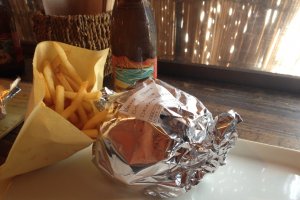 Burgers arrive wrapped in foil to prevent any juices escaping