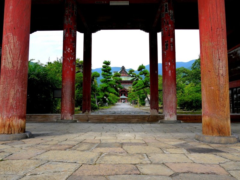 <p>View of main hall framed by the gate</p>
