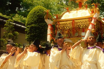 <p>Bearers of one of the three omikoshi or portable shrines that are seen in the procession. This one bears a phoenix, which represents the living spirit of the deified Tokugawa Iyasu. The omikoshi are displayed during the year at the Tosho-gu shrine.</p>