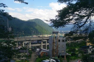 <p>The view down into Yuzawa from outside the onsen</p>