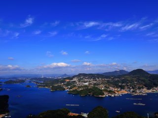 Color of the sky, the East China Sea, and the houses on the hillsides of the Mt. Ishi create exotic scenery