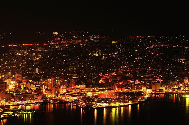 <p>Shimmering city of gold at night, Nagasaki: This city has prospered through trade with European countries, China and Russia since olden times</p>