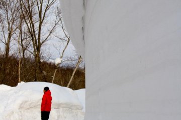 <p>Walking through snow walls near the Inn</p>