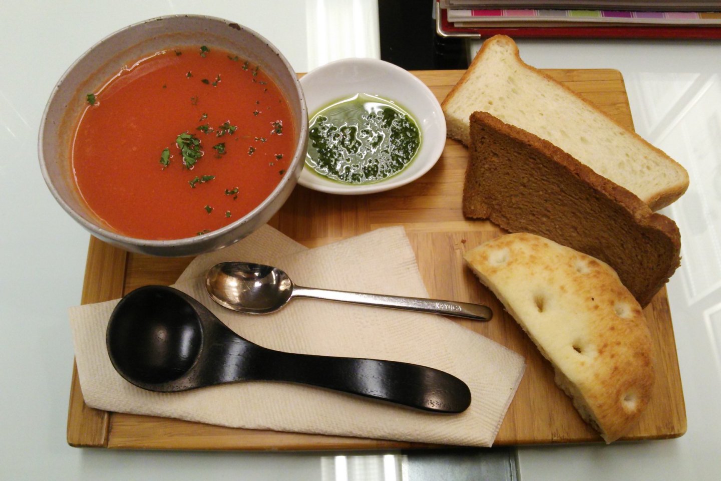 The soup is made from organic vegetables; the range of flavors depends on what's available. It comes with bread and a basil sauce that's a lot like pesto.