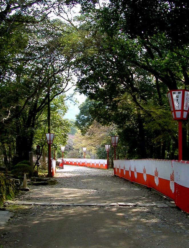 <p>Red and white awnings (celebration colors in Japan) border some of the paths</p>