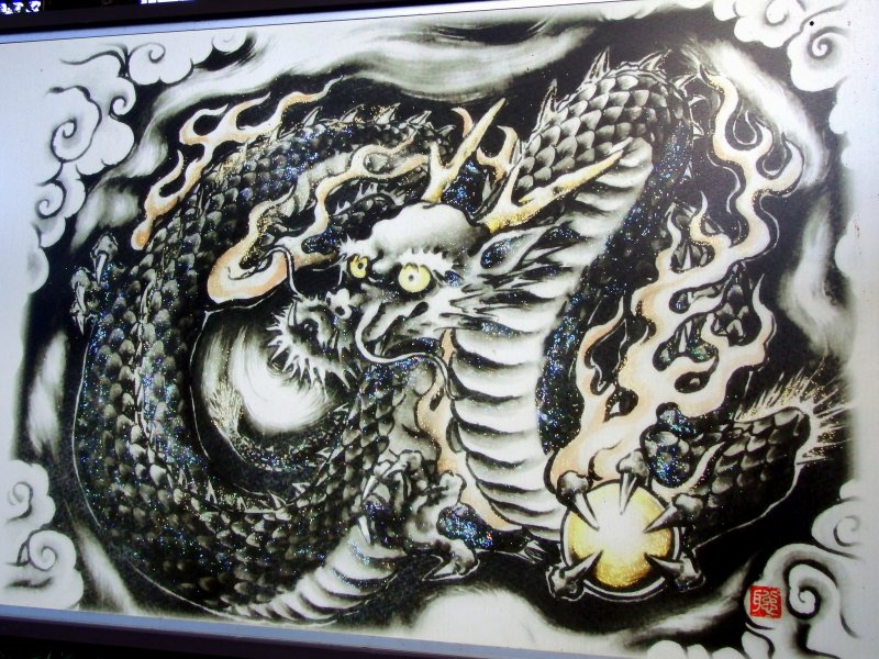<p>A painting of the Black Dragon displayed on the shrine grounds</p>