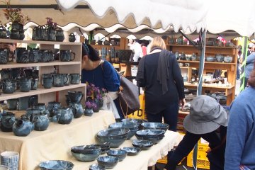 <p>Stalls selling all styles of pottery offer heavily discounted pottery during the fair</p>