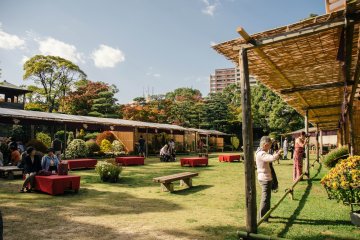 <p>Place where people can sit and drink tea being sold at the garden</p>