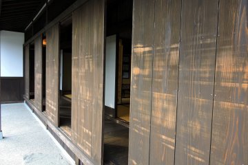 <p>Wooden sliding doors of the retreat</p>