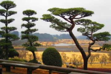 The view from Kairakuen over Lake Senba in the rain
