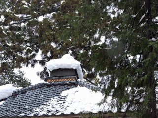 Snow-covered temple roof