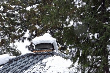 <p>Snow-covered temple roof</p>