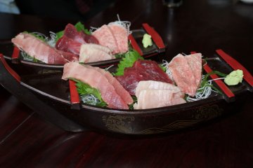 <p>Sashimi boat includes four different cuts of maguro tuna</p>