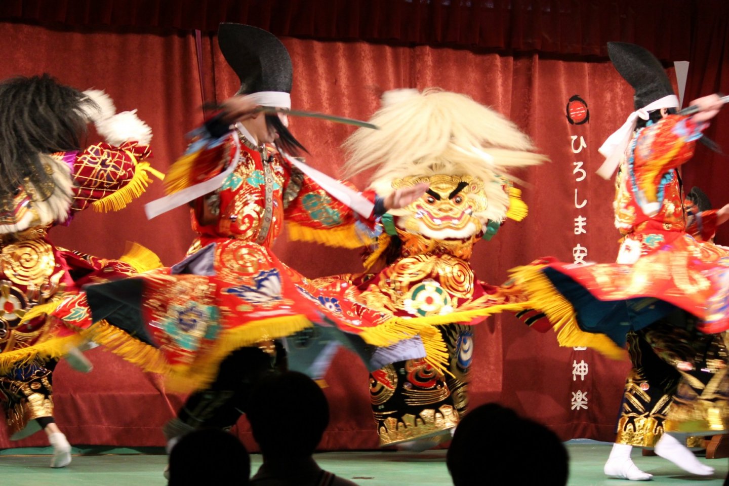 Spinning quickly in unison with costumes flaring, one of the famous trademarks of Kagura