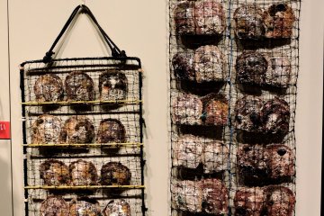 <p>Pocket panel nets loaded with oysters</p>