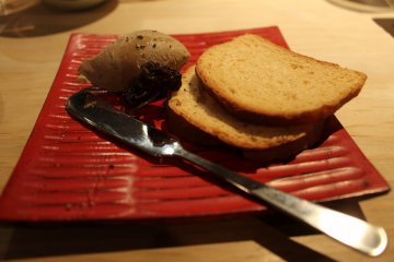 <p>An appetizer of toast and a house specialty, chicken liver mousse. Sweet and delicious</p>