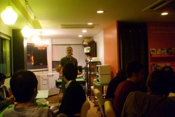 <p>The host of the comedy show warms up the audience</p>