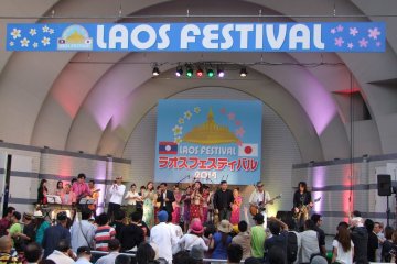 <p>Watching the performers at the Laos Festival</p>