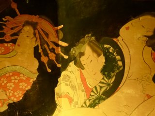 The painting on the wall is also known as &quot;Shunga,&quot; a type of erotic ukiyo-e that developed in the Edo&nbsp;Period.