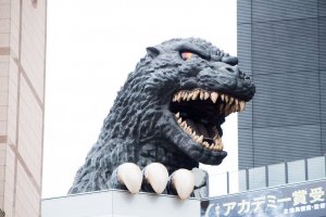 A real-scale head of Godzilla is displayed at the balcony of the newly built commercial complex as a new Tokyo landmark during its unveiling in Shinjuku on Thursday 17th April