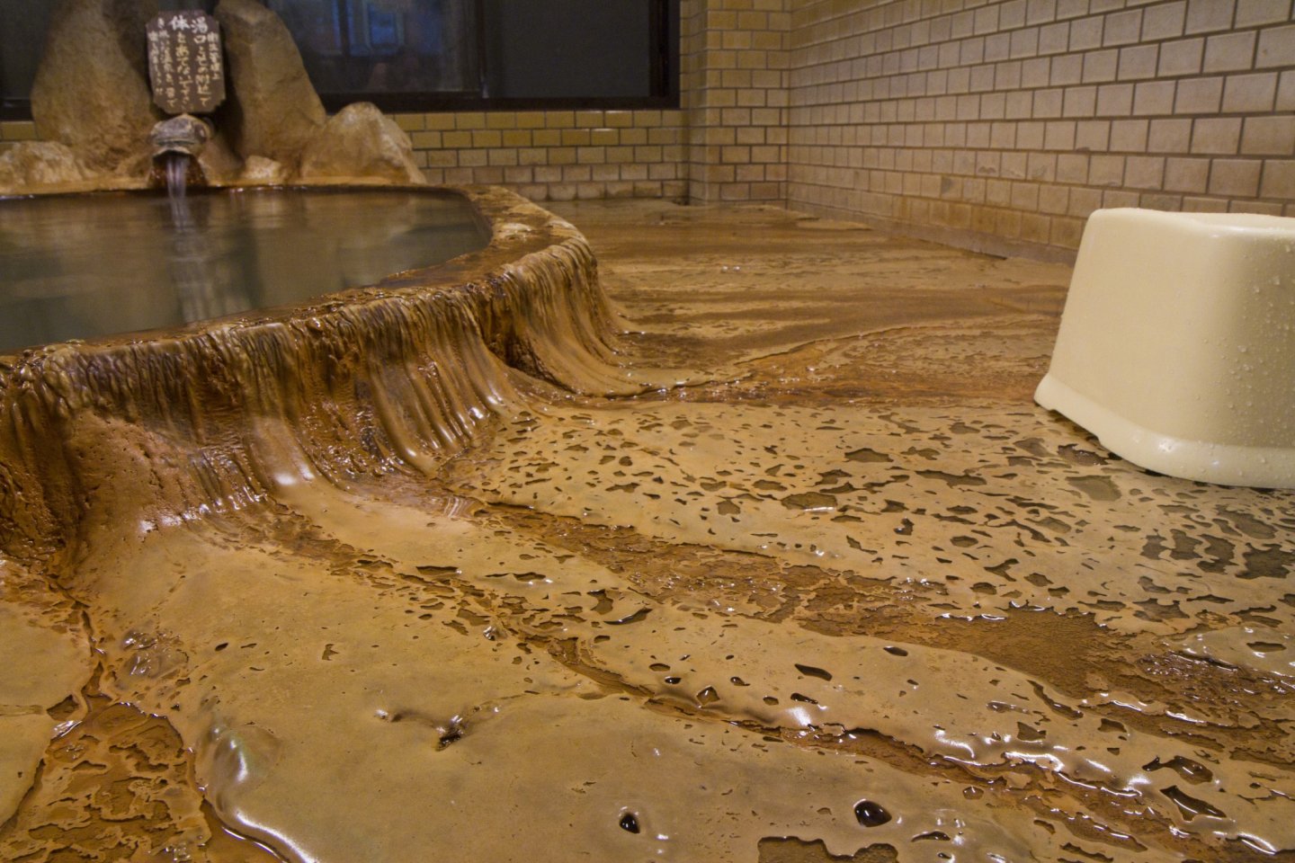 Iron deposits cover the floor after decades of flow of these natural healing waters